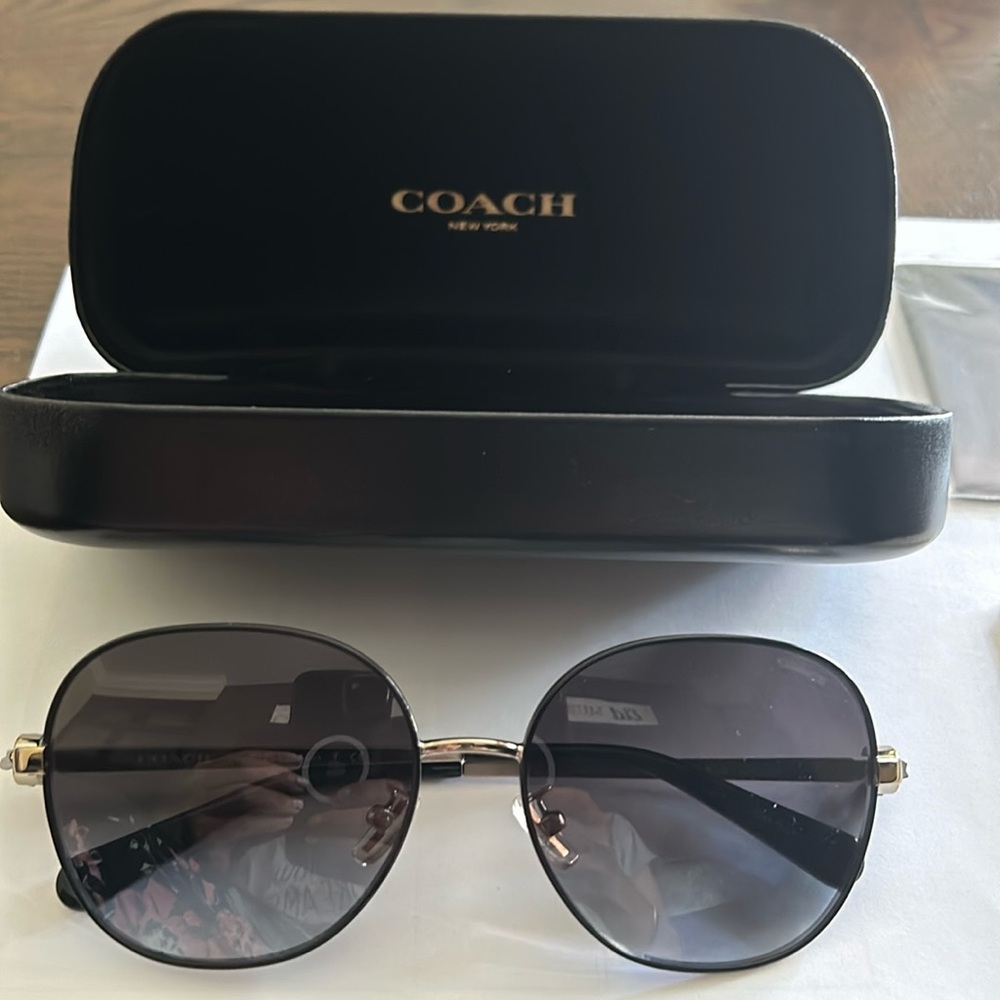 Brand new Coach sunglasses.